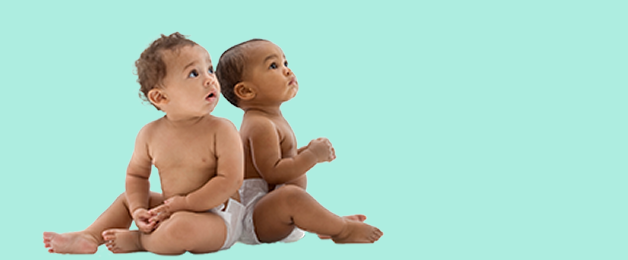 Two babies sitting down looking up to see how PREVNAR 20 can help provide protection against invasive pneumococcal disease for babies. See safety info.